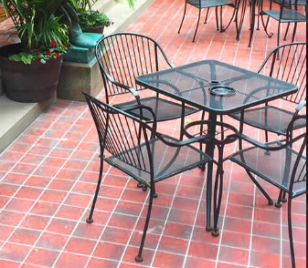 a brick patio repaired by Custom Restoration